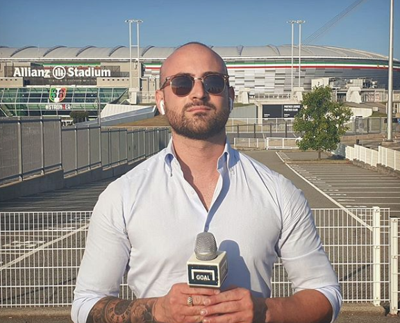 Romeo Agresti outside the Allianz stadium working for Goal