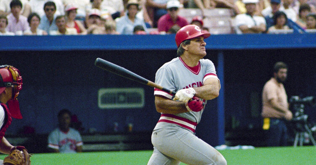 Pete rose playing baseball